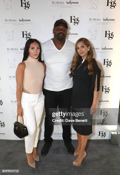 Dereck Chisora and Dr Nigma Talib attend a celebration of wellness and personal wellbeing at Embassy Gardens on July 6, 2017 in London, England.