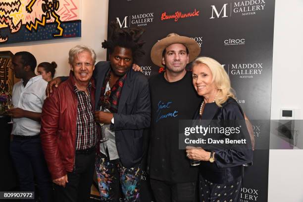 James Nicholls, Bradley Theodore, Danny Minnick and Danielle Nicholls attend a private view of 'One Love', the first UK solo exhibition from LA...