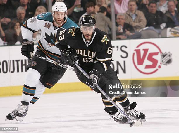 Mike Ribeiro of the Dallas Stars skates against Joe Thornton of the San Jose Sharks during game six of the 2008 NHL Western Conference Semifinals of...