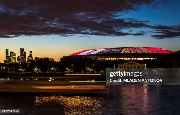 The FIFA World Cup Trophy is projected on the roof of the Luzhniki Olympic stadium, marking the FIFA World Cup Trophy Tour Route announcement on July...
