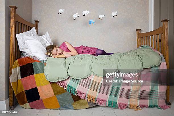 a girl counting sheep - sleep sheep stock pictures, royalty-free photos & images