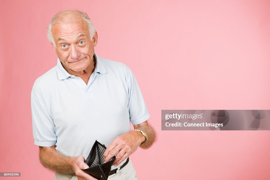 Man with empty wallet