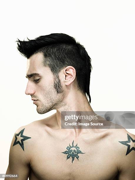 man with tattoos - torso stock pictures, royalty-free photos & images
