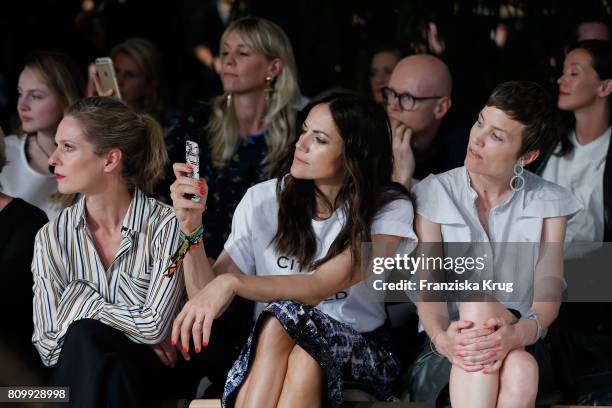 Lisa Martinek, Bettina Zimmermann and Saskia Diez, jewellery designer, attend the Dorothee Schumacher show during the Mercedes-Benz Fashion Week...