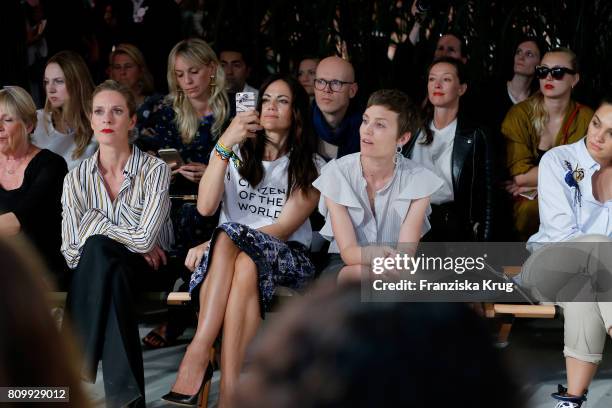 Lisa Martinek, Bettina Zimmermann and Saskia Diez, jewellery designer, attend the Dorothee Schumacher show during the Mercedes-Benz Fashion Week...