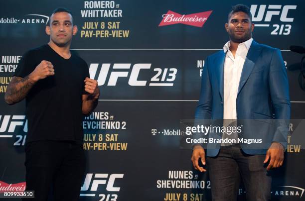 Fabricio Werdum of Brazil and Alistair Overeem of England pose for a picture for the media during the UFC 213 Ultimate Media Day at T-Mobile Arena on...