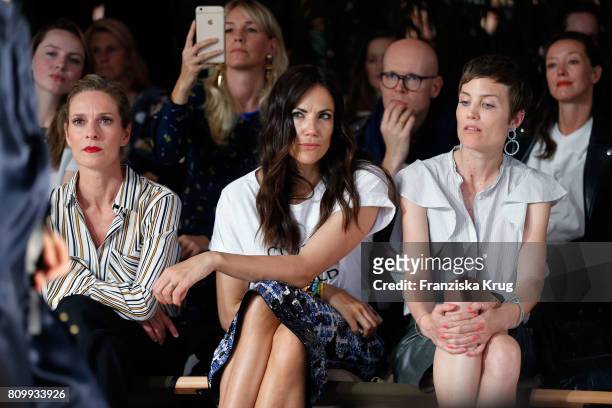 Lisa Martinek, Bettina Zimmermann and Saskia Diez, jewellry designer, attend the Dorothee Schumacher show during the Mercedes-Benz Fashion Week...