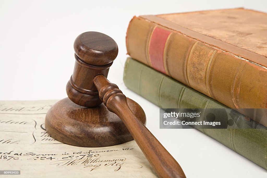 A property document books and a gavel