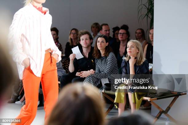 Harry Dean Lewis, Amira El Sayed and Julia Dietze attend the Dorothee Schumacher show during the Mercedes-Benz Fashion Week Berlin Spring/Summer 2018...