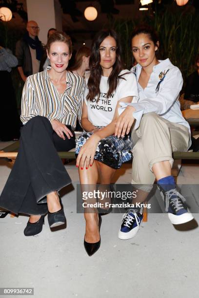 Lisa Martinek, Bettina Zimmermann and a fashion show guest attend the Dorothee Schumacher show during the Mercedes-Benz Fashion Week Berlin...