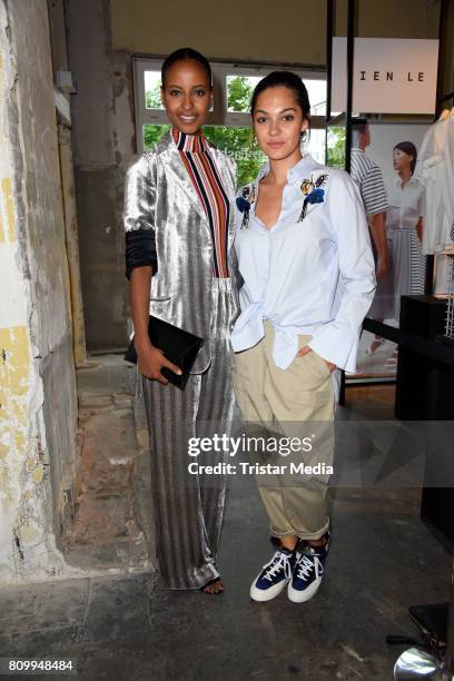 Sara Nuru and Nilam Farooq attend the Dorothee Schumacher Show during the Mercedes-Benz Fashion Week Berlin Spring/Summer 2018 at Kaufhaus Jandorf on...