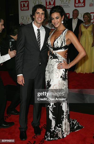 Model Megan Gale and boyfriend Andy Lee arrives on the red carpet at the 50th Annual TV Week Logie Awards at the Crown Towers Hotel and Casino on May...