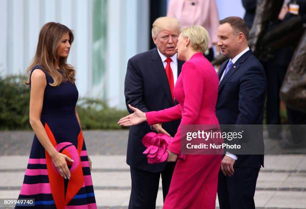 Polish President's wife Agata Kornhauser-Duda leaves Donald Trump hand on 06 July, 2017 in Warsaw, Poland. US President Donald Trump is on his first...