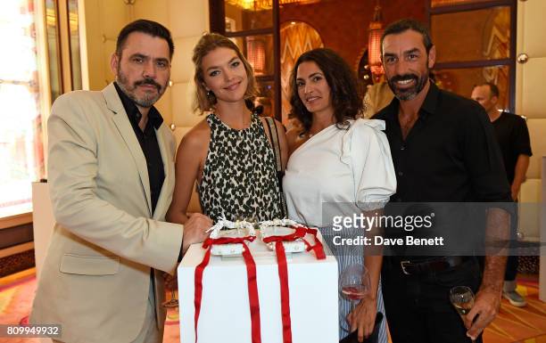 Roland Mouret, Arizona Muse, Jessica Lemarie-Pires and Robert Pires attend a private dinner to celebrate the Havaianas Art Auction in aid of Women...