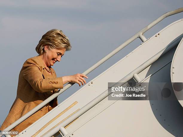 Democratic presidential hopeful Sen. Hillary Clinton , after speaking at a campaign event at the Merrillville fire department, boards her campaign...