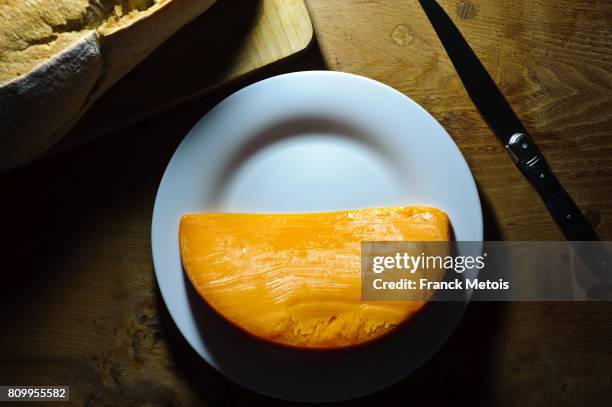 mimolette cheese - mimolette stock pictures, royalty-free photos & images