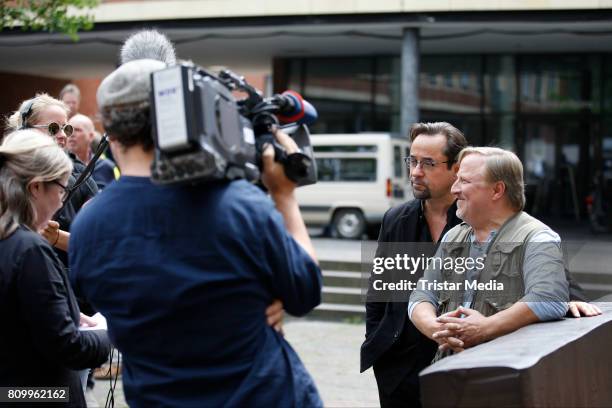 Jan Josef Liefers and Axel Prahl during the 'Tatort - Gott ist auch nur ein Mensch' On Set Photo Call on July 5, 2017 in Muenster, Germany.