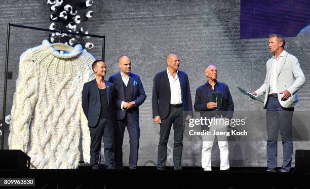 Marc O'Polo COO Bernd Keller, CFO Juergen Hahn, CEO Alexander Gedat, Marc O'Polo owner Werner Boeck and mayor Stephanskirchen Rainer Auer during the...