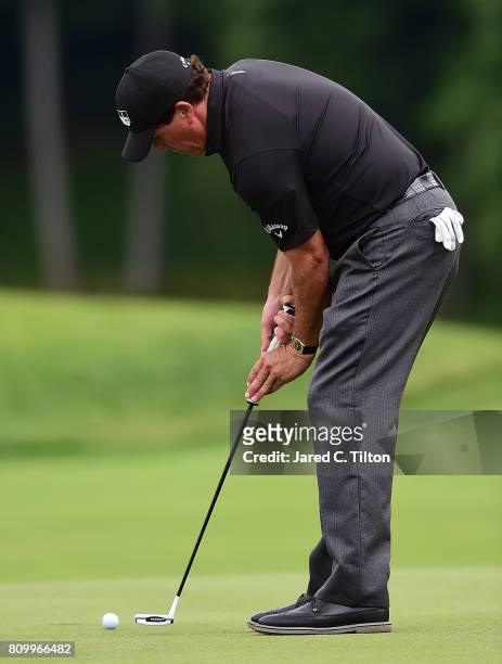 Phil Mickelson putts on the 10th green during round one of The Greenbrier Classic held at the Old White TPC on July 6, 2017 in White Sulphur Springs,...