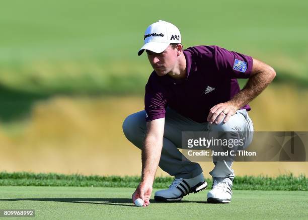 Nick Taylor of Canada lines up his birdie putt on the eighth green during round one of The Greenbrier Classic held at the Old White TPC on July 6,...