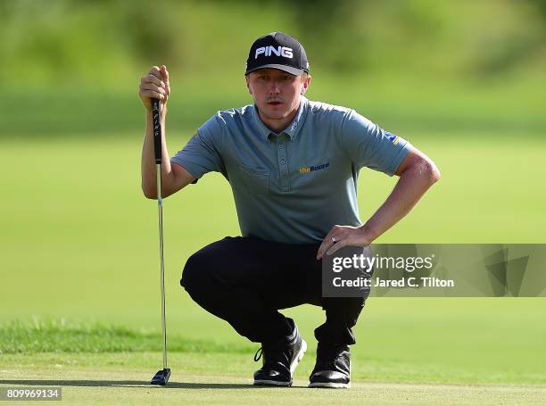 Mackenzie Hughes of Canada lines up his putt on the 17th green during round one of The Greenbrier Classic held at the Old White TPC on July 6, 2017...