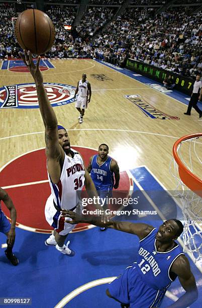 Rasheed Wallace of the Detroit Pistons gets a shot off over Dwight Howard of the Orlando Magic during Game Two of the Eastern Conference Semifinals...