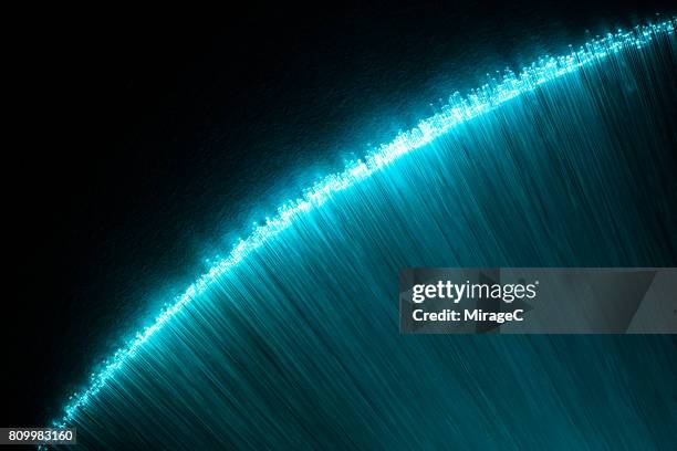 fiber optic arch with cyan colored light - evolution　 vision stock pictures, royalty-free photos & images