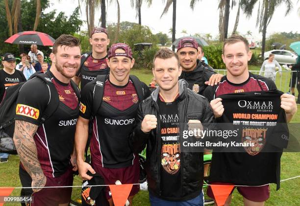 Welterweight Boxing World Champion Jeff Horn poses for a photo with Maroons players Josh McGuire, Coen Hess, Billy Slater, Valentine Holmes and...