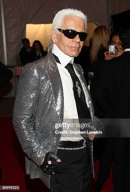 Designer Karl Lagerfeld departs from the Metropolitan Museum of Art Costume Institute Gala, Superheroes: Fashion and Fantasy held at The Metropolitan...