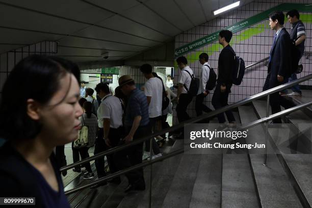 Commuters walk through the Metro on July 7, 2017 in Seoul, South Korea. The U.S. Said that it will use military force if needed to stop North Korea's...