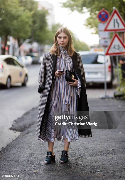 Swantje Soemmer wearing a striped dress during the Mercedes-Benz Fashion Week Berlin Spring/Summer 2018 at Kaufhaus Jandorf on July 6, 2017 in...
