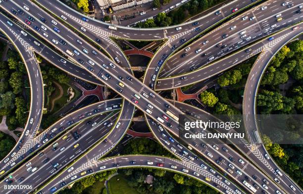 road junction in shanghai - overpass stock pictures, royalty-free photos & images