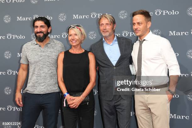 Numan Acar, Mads Mikkelsen and his wife Hanne Jacobsen and Tom Wlaschiha during the 50th anniversary celebration of Marc O'Polo at its headquarters...