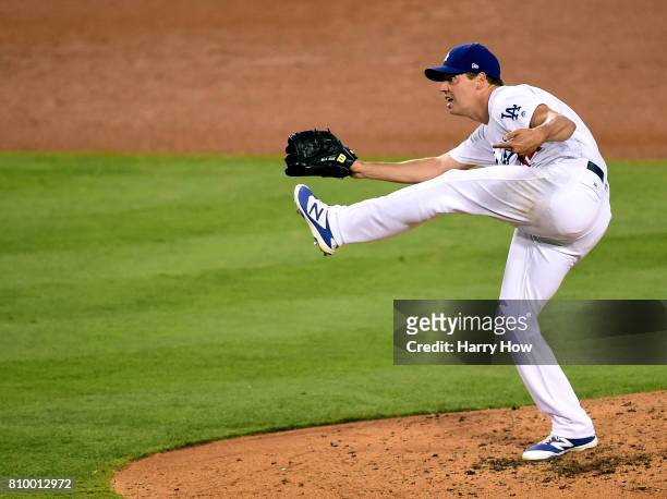 Rich Hill of the Los Angeles Dodgers pitches to the Arizona Diamondbacks during the fourth inning at Dodger Stadium on July 6, 2017 in Los Angeles,...