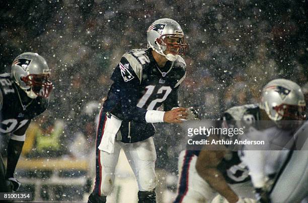 New England Patriots quarterback Tom Brady calls signals in shotgun formation during the Patriots 16-13 overtime victory over the Oakland Raiders in...