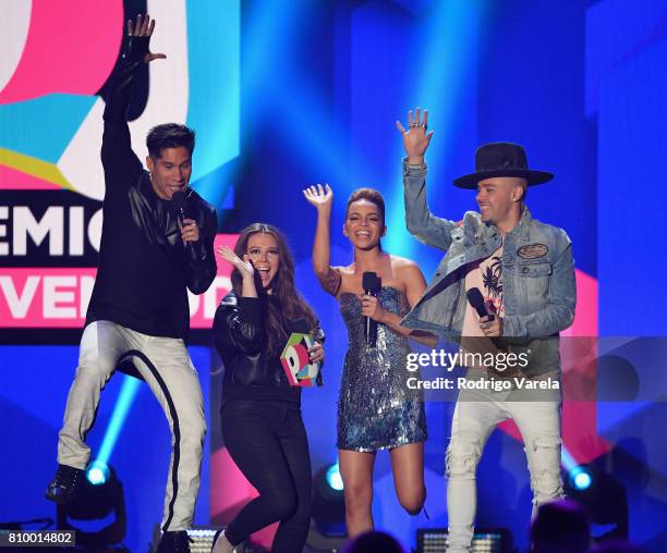 Chino Miranda, Joy Uecke, Leslie Grace and Jesse Uecke present an award during Univision's "Premios Juventud" 2017 Celebrates The Hottest Musical...