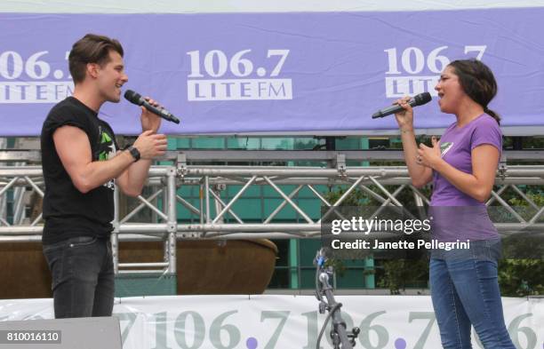 Michael Campayno and Jennifer DiNoia from the cast of Wicked perform at 106.7 Lite FM's Broadway In Bryant Park on July 6, 2017 in New York City.