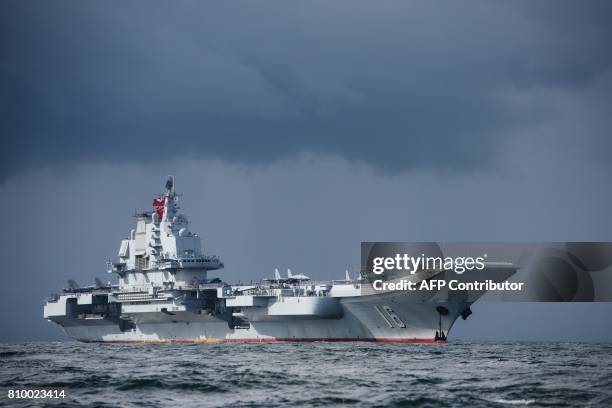 China's sole aircraft carrier, the Liaoning, arrives in Hong Kong waters on July 7 less than a week after a high-profile visit by Chinese President...
