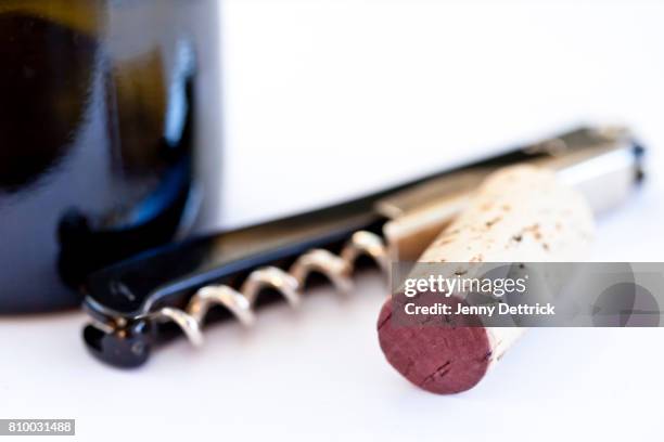 corkscrew, cork and wine bottle - wine cork stockfoto's en -beelden