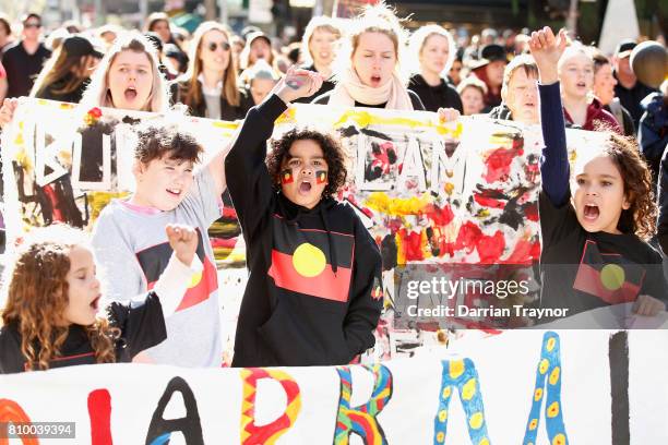 Group of young kids take part in the 2017 NAIDOC March on July 7, 2017 in Melbourne, Australia. The march was organised to call for a day of mourning...