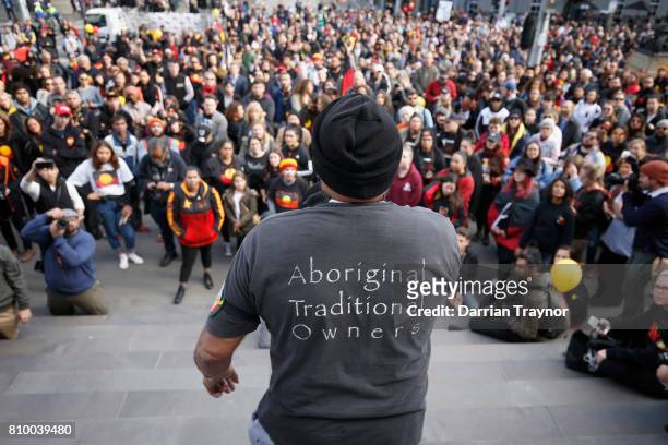 Speakers adress the large crowd on the steps of Parliament House during the 2017 NAIDOC March on July 7, 2017 in Melbourne, Australia. The march was...