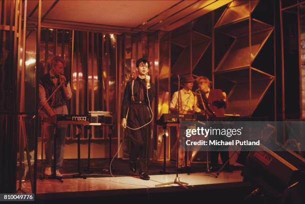 Depeche Mode appear on Top The Pops TV show L-R Andrew Fletcher, Dave Gahan, Martin Gore, Vince Clarke. They play Roland, Moog and Yamaha...