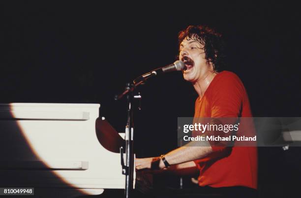 Burton Cummings, lead singer and keyboardist for the Canadian rock band The Guess Who, performs on July 22, 1977.