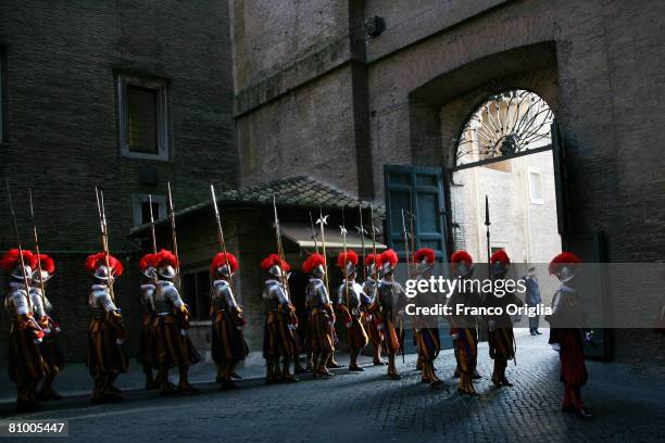 New recruits of the Vatican's elite Swiss Guard march at the swearing in ceremony for new members on May 6, 2008 in Vatican City. The swearing in...