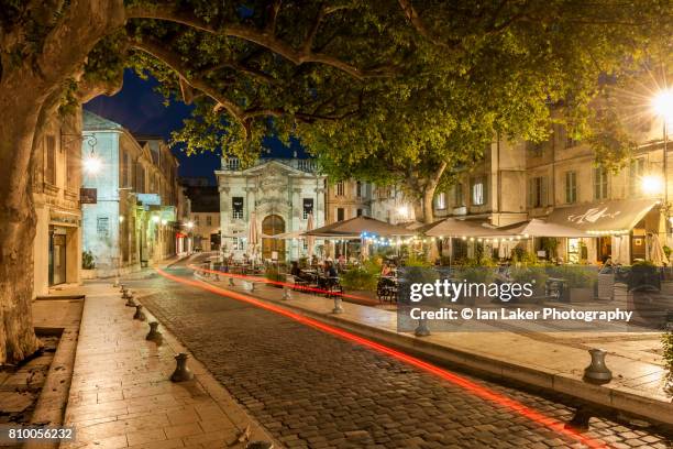 place crillon at night with car light trail. avignon, provence-alpes-côte d'azur, france. - region provence alpes côte dazur stock-fotos und bilder