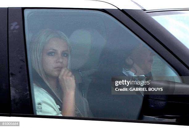 Pop star Britney Spears leaves the Los Angeles County Superior courthouse after a child custody status hearing on May 6, 2008. Spears has been locked...