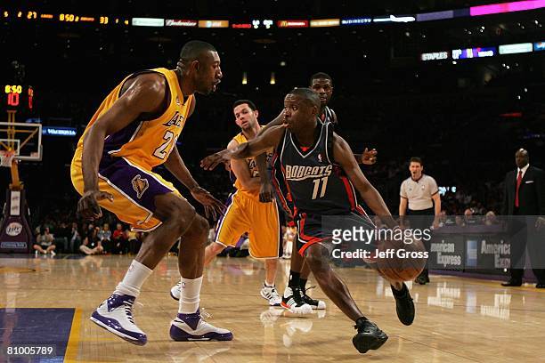 Earl Boykins of the Charlotte Bobcats drives to the basket against Didier Ilunga-Mbenga of the Los Angeles Lakers on March 26, 2008 at Staples Center...