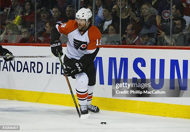 Scott Hartnell of the Philadelphia Flyers skates with the puck against the Montreal Canadiens during Game Five of the Eastern Conference Semifinals...