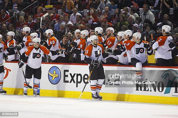 The Philadelphia Flyers celebrate at the bench against the Montreal Canadiens during Game Five of the Eastern Conference Semifinals of the 2008 NHL...