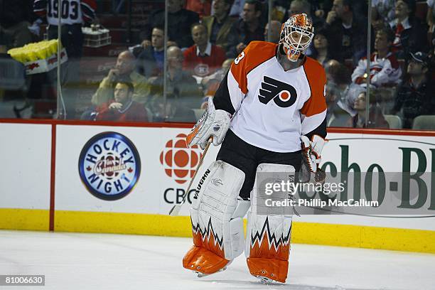 Martin Biron of the Philadelphia Flyers takes a moment against the Montreal Canadiens during Game Five of the Eastern Conference Semifinals of the...